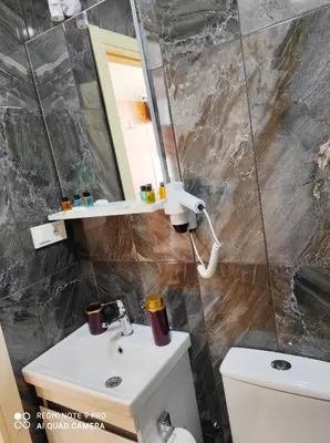 a bathroom with a sink and a mirror at Lebon Hotel-Special Class in Istanbul