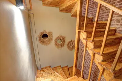 an overhead view of a room with wooden stairs at Maravilloso Hotel Pera in Istanbul