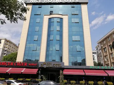 a building with a sign on top of it at Nice Royal in Istanbul