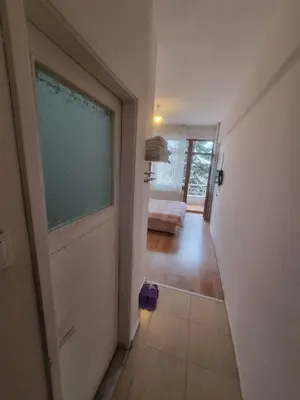 a hallway with a door leading to a bedroom at Thermal Orkide Pansiyon in Yalova