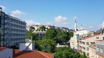a view of a city with a mosque and buildings at Casa Rosa Suites in Istanbul