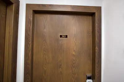 a wooden door with the number on it at Golden Street Hotel in Istanbul