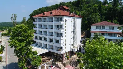 an overhead view of a large white building with a red roof at Thermal Saray Hotel & Yalova in Gokcedere