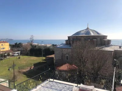 a view of a building with a pool and a dome at Little sofia hotel in Istanbul