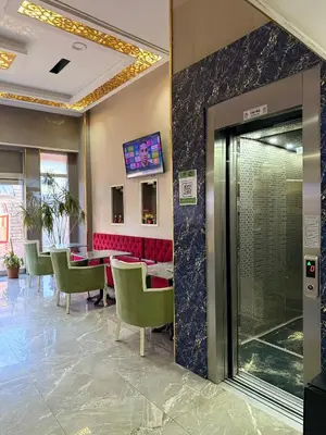 a restaurant with tables and chairs in a room at RHYTHM HOTEL in Istanbul