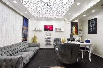 an office with a couch and a desk and a table at Armar Hotel in Istanbul