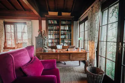 a room with a desk with a laptop on it at The Lake House in Boyalıca