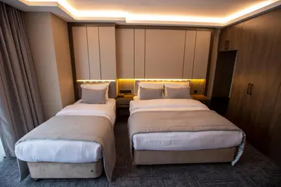 two beds in a hotel room with at THE GREEN HOTEL in Istanbul