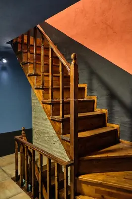 a wooden staircase in a room with a wall at Reu de Hotel in Istanbul