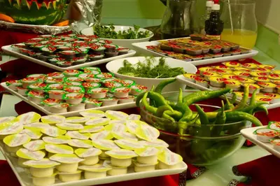 a buffet filled with many different types of food at Kumburgaz Blue World Hotel in Buyukcekmece