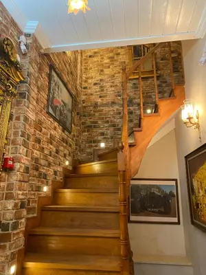 a staircase in a building with a brick wall at Bosphorus Bridge in Istanbul