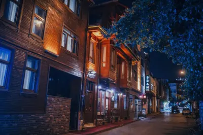 a city street at night with a building at Acacia Mansion Hotel in Istanbul