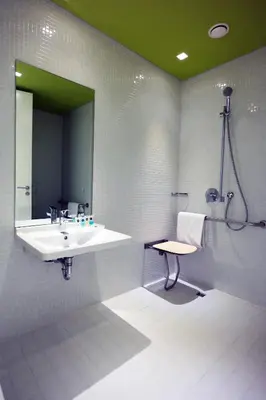 a bathroom with a sink and a shower at Workinn Hotel in Gebze