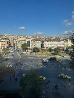 a large parking lot with cars in a city at GRAND VATAN HOTEL in Istanbul