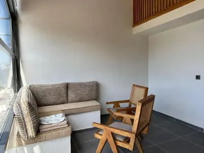 a living room with two chairs and a couch at Sahil Kamp İstanbul Hotel in Sile