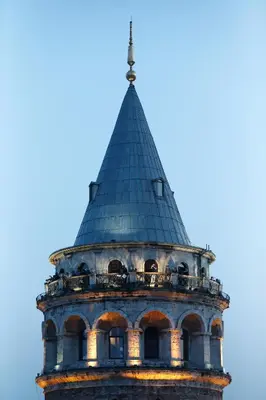 a tall tower with a blue roof at Duo Galata Hotel in Istanbul