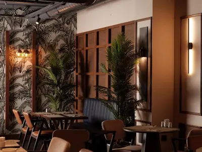 a restaurant with tables and chairs and a plant at Jaff Hotels & Spa Nisantasi in Istanbul