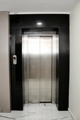 a elevator with a metal door in a building at Blueway Hotel Istanbul Bakırköy City Center in Istanbul