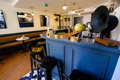 a bar with a blue counter in a restaurant at Le Banc in Istanbul