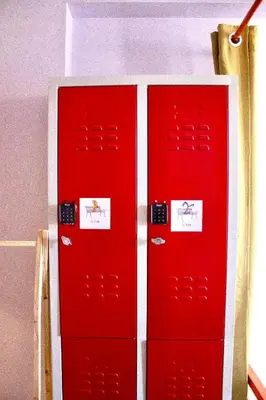 two red lockers are sitting in a room at Le Banc in Istanbul