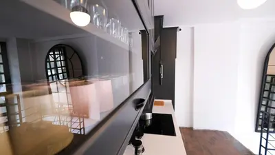 a kitchen with a stove and a counter top at Le Banc in Istanbul