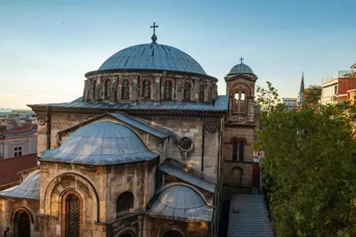 an old building with a clock tower on top of it at Gloria Suites Old City in Istanbul