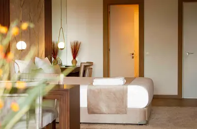 a hotel room with a bed and a desk and sidx sidx sidx at Maslak Aparts in Istanbul
