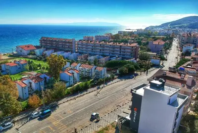 an aerial view of a city and the ocean at MOPE Hotel in Tekirdag