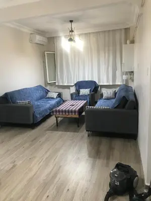 a living room with two couches and a couch at Hakan’s apartment in Istanbul