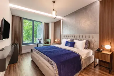 a hotel room with a bed and a window at Union Hotel Port in Istanbul