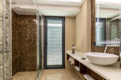 a bathroom with a sink and a shower at Union Hotel Port in Istanbul