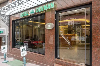a store window with a sign on the side of it at The Hotel Devman & Terrace in Istanbul