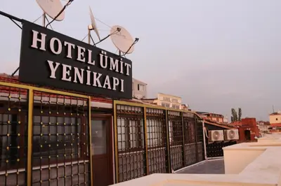 a sign on the roof of a hotel unit kerkan at HOTEL ÜMİT YENİKAPI in Istanbul