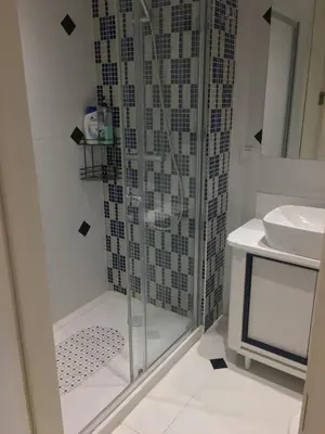 a bathroom with a shower and a sink at Cosy Studio Flat -One Room in a new residence near Taksim in Istanbul