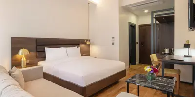 a hotel room with a bed and a desk at The Rooms Nisantasi in Istanbul