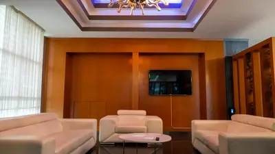 a waiting room with couches and a tv on a ceiling at MOX Hotel Wellness & Spa in Sapanca