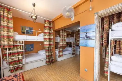 a room with two bunk beds and a hallway at Bahaus Guest House Hostel Near Sultanahmet & Agia Sofia in Istanbul