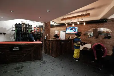a group of people standing at a counter in a restaurant at Oksijen Zone Hotel & Spa - Full Board Plus in Uludag