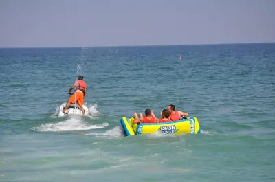 a group of people riding on a raft in the water at İğneada Resort Hotel & SPA in Igneada