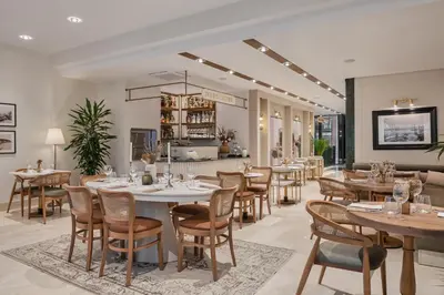 a restaurant with tables and chairs in a room at Delita City Hotel in Istanbul
