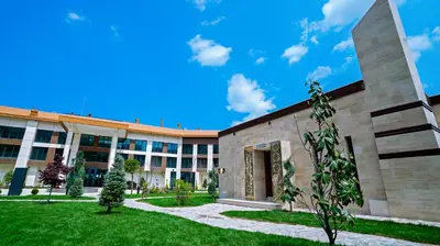 a university building with a blue sky in the background at Cabir Deluxe Hotel Sapanca in Sapanca