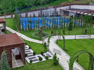 a view of a swimming pool in a park at Cabir Deluxe Hotel Sapanca in Sapanca