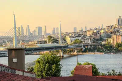 a bridge over a river with a city in the background at Golden Horn Park Hotel in Istanbul