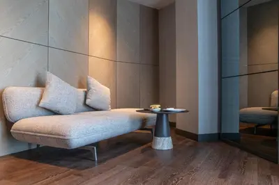 a chair and a table in a room at Melas Hotel Istanbul in Istanbul