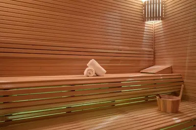 a sauna with a towel sitting on a bench at Melas Hotel Istanbul in Istanbul
