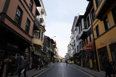 a city street with people walking down the street at GREEN SUITES BURSA in Bursa