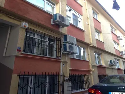 a building with two air conditioners on the side of it at Yilmaz Apart in Istanbul