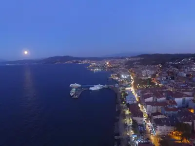 an aerial view of a city at night at Hotel Mudanya in Mudanya
