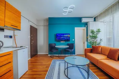 a living room with a couch and a table at Taksim Wonder Suites in Istanbul