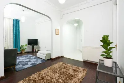 a living room with a couch and a table at Cozy Apartment Next to Taksim Square in Istanbul